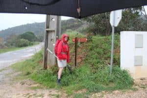 Sally Kelly walking in the rain