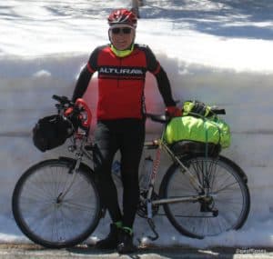 Geoff Jones with bike and snow drift