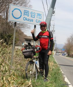 Geoff Jones with bicycle in Okaya